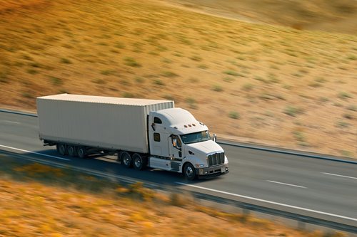 truck driving down highway