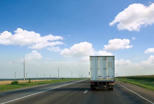 truck driving down the road